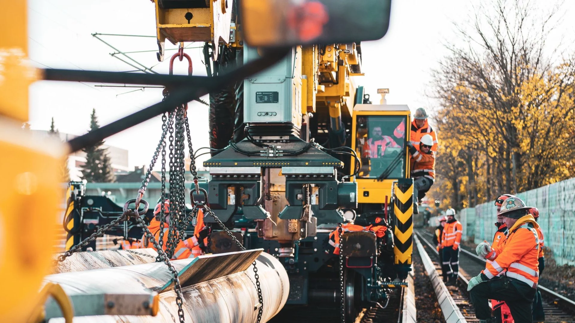 Industrial construction site with workers and safety equipment, illustrating risk detection and prevention