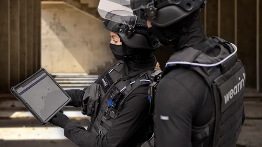 Tactical team using a digital dashboard to monitor an unfolding situation in real time