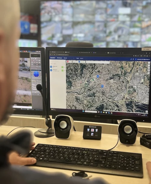 Wearin' private security dashboard. Control room operator monitoring team locations in real time.
